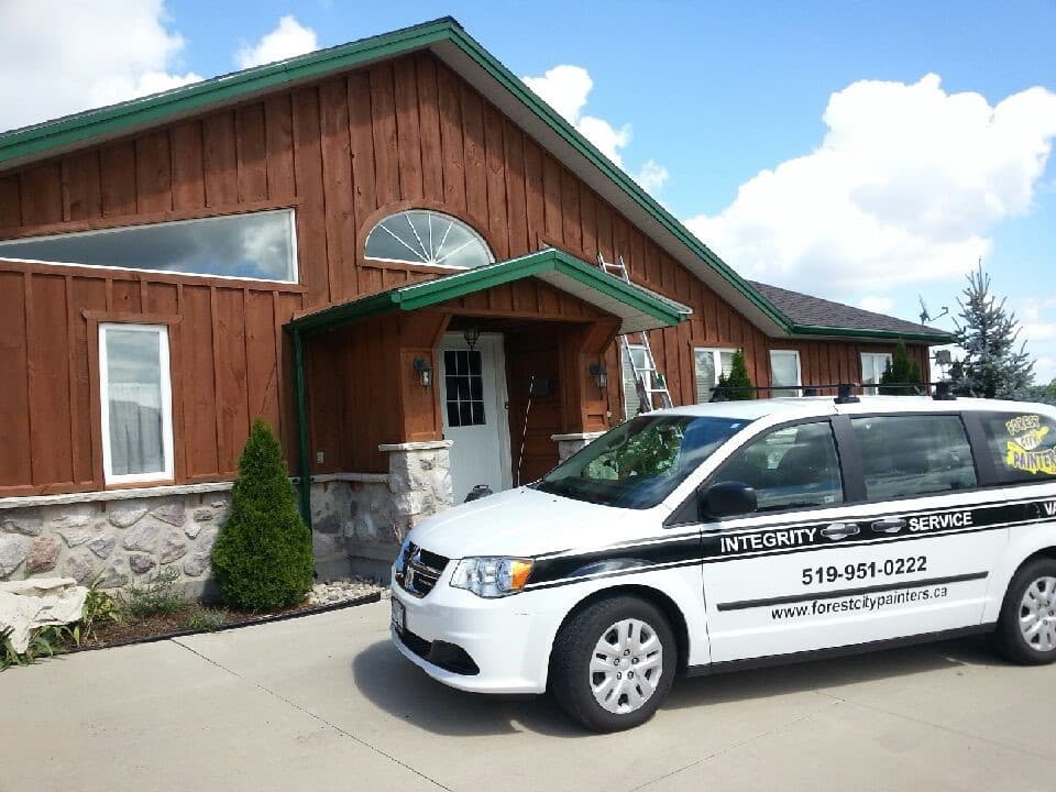 A wooded home freshly sealed against the elements